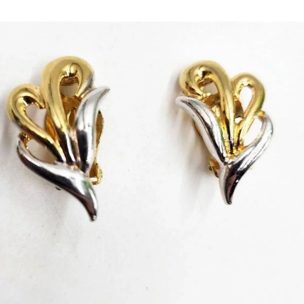 Vintage climber clip earring in gold silver swirls